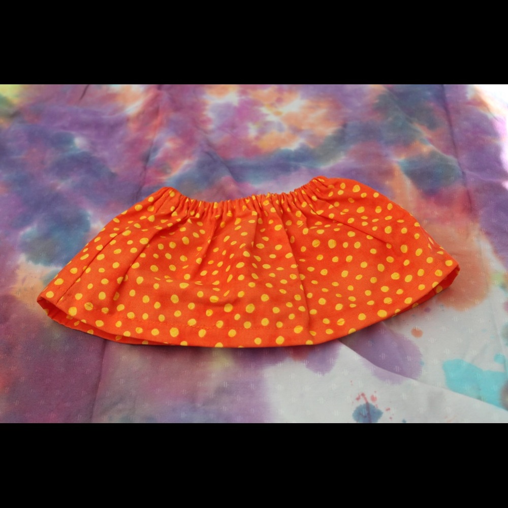 Orange and yellow polka dot skirt